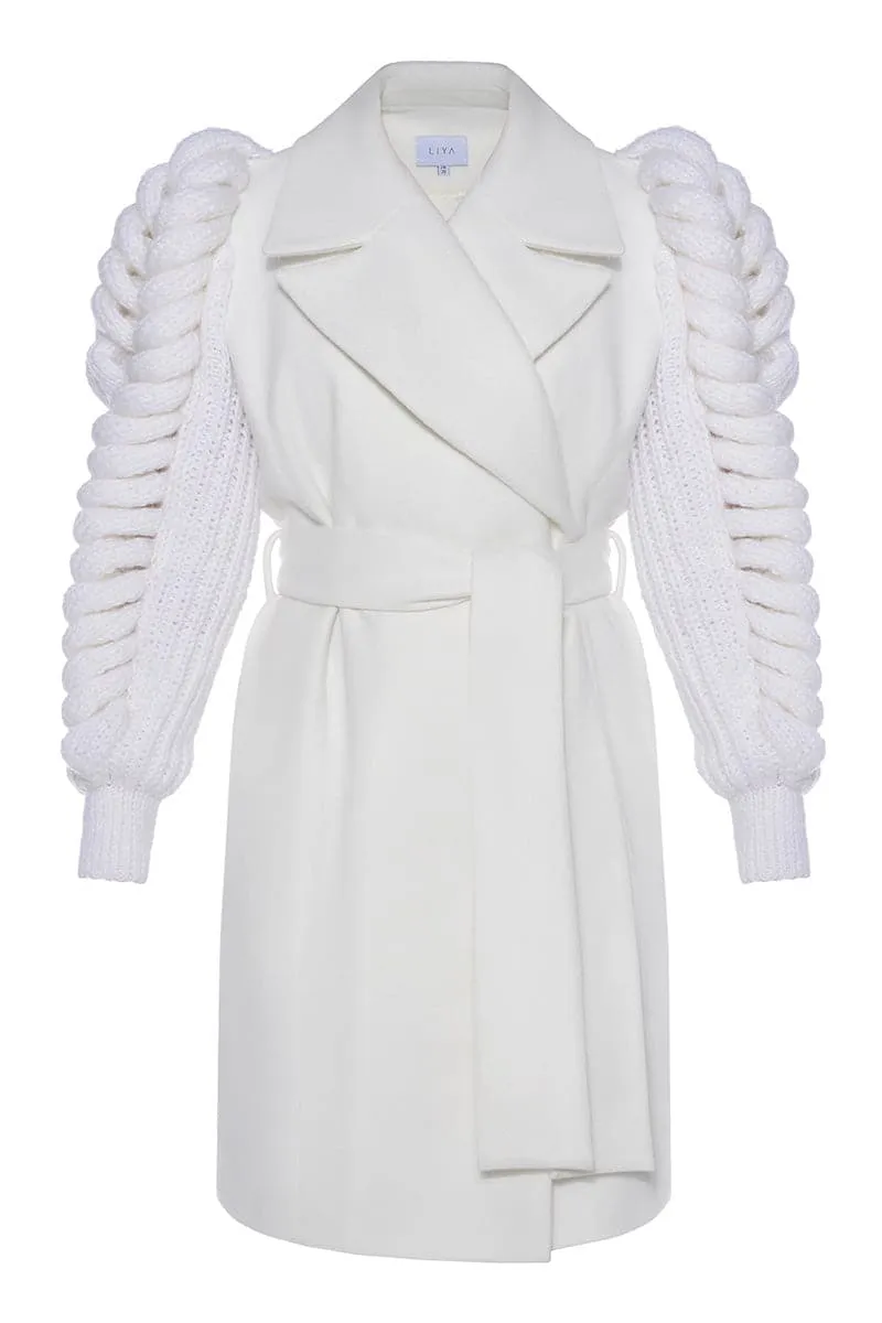 BELTED WHITE COAT WITH KNITTED SLEEVES